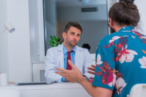 Patient talking to health professional at a partial hospitalization program