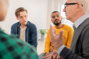 Folks sitting therapy in an outpatient treatment