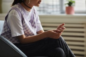 Person sitting in chair during dual diagnosis