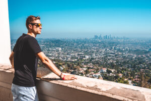 Young man looking over LA skyline